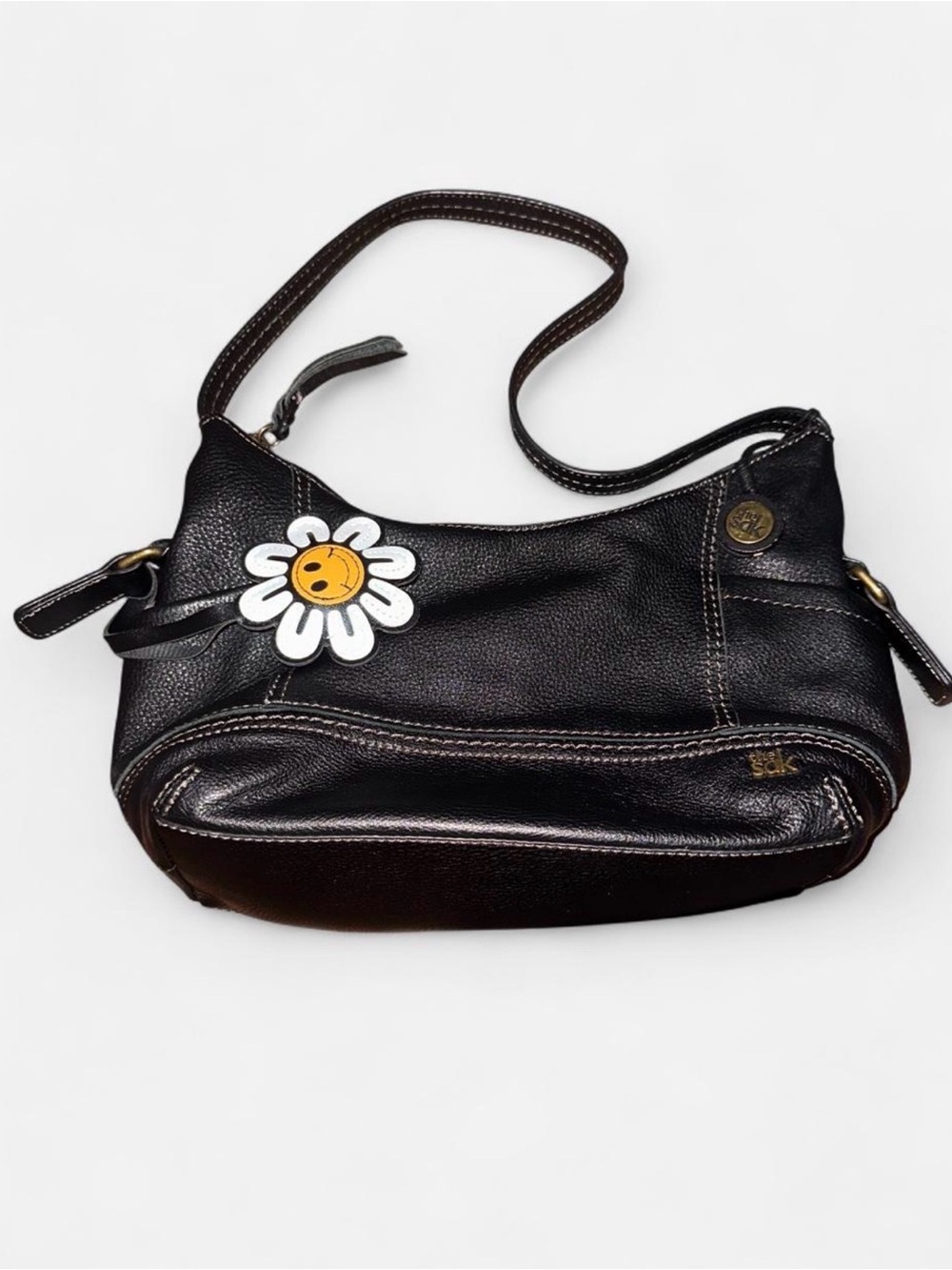 The Sak Black Leather Shoulder Bag with Daisy Charm